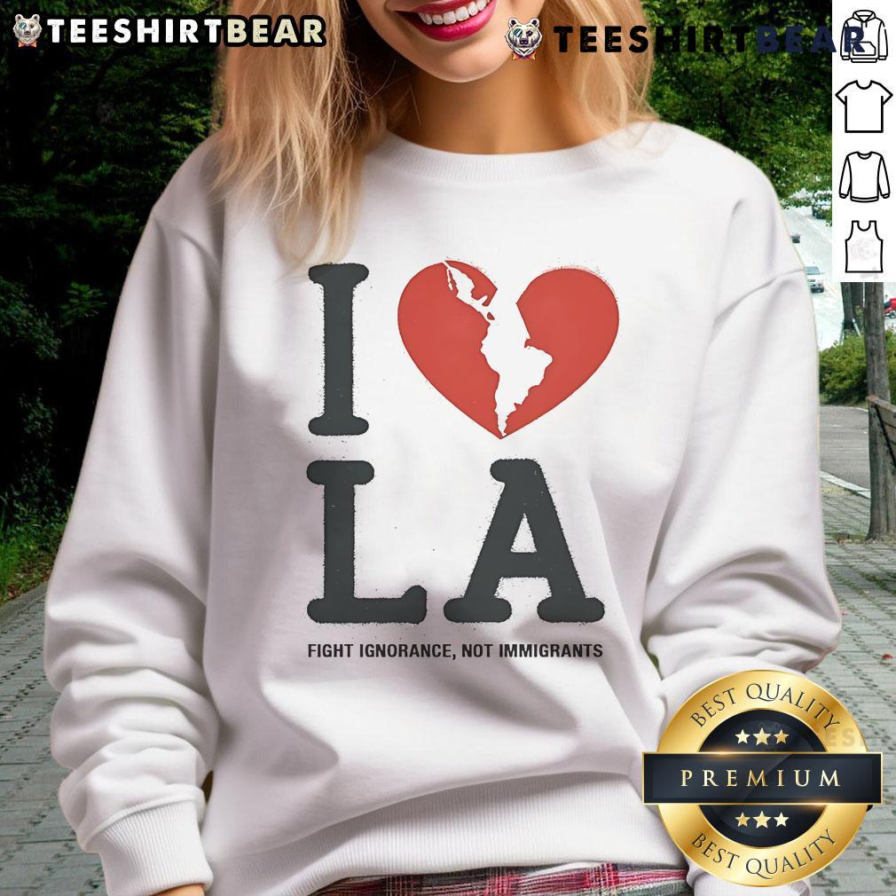 Top I Heart Broken LA Fight Ignorance Not Immigrants sweatshirt showcasing a bold message on social justice and inclusivity.