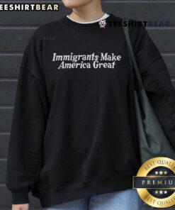 Top Immigrants Make America Great sweatshirt in navy blue, showcasing a bold white graphic design.