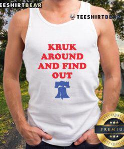 Top Kruk Around and Find Out Bella Canvas Philadelphia baseball tank top displayed on a hanger with a vibrant design.