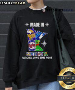 Cozy Top Made In Minnesota A Long Long Time Ago sweatshirt in vibrant colors, perfect for casual wear.
