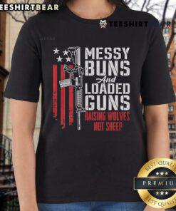 Top Messy Buns and Loaded Guns tee for pro-gun ladies, featuring a bold 'Raising Wolves Not Sheep' design.