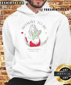 Top Mommy To Be Growing A Tiny Miracle Hoodie - Stylish maternity wear for expecting mothers, celebrating pregnancy joy.