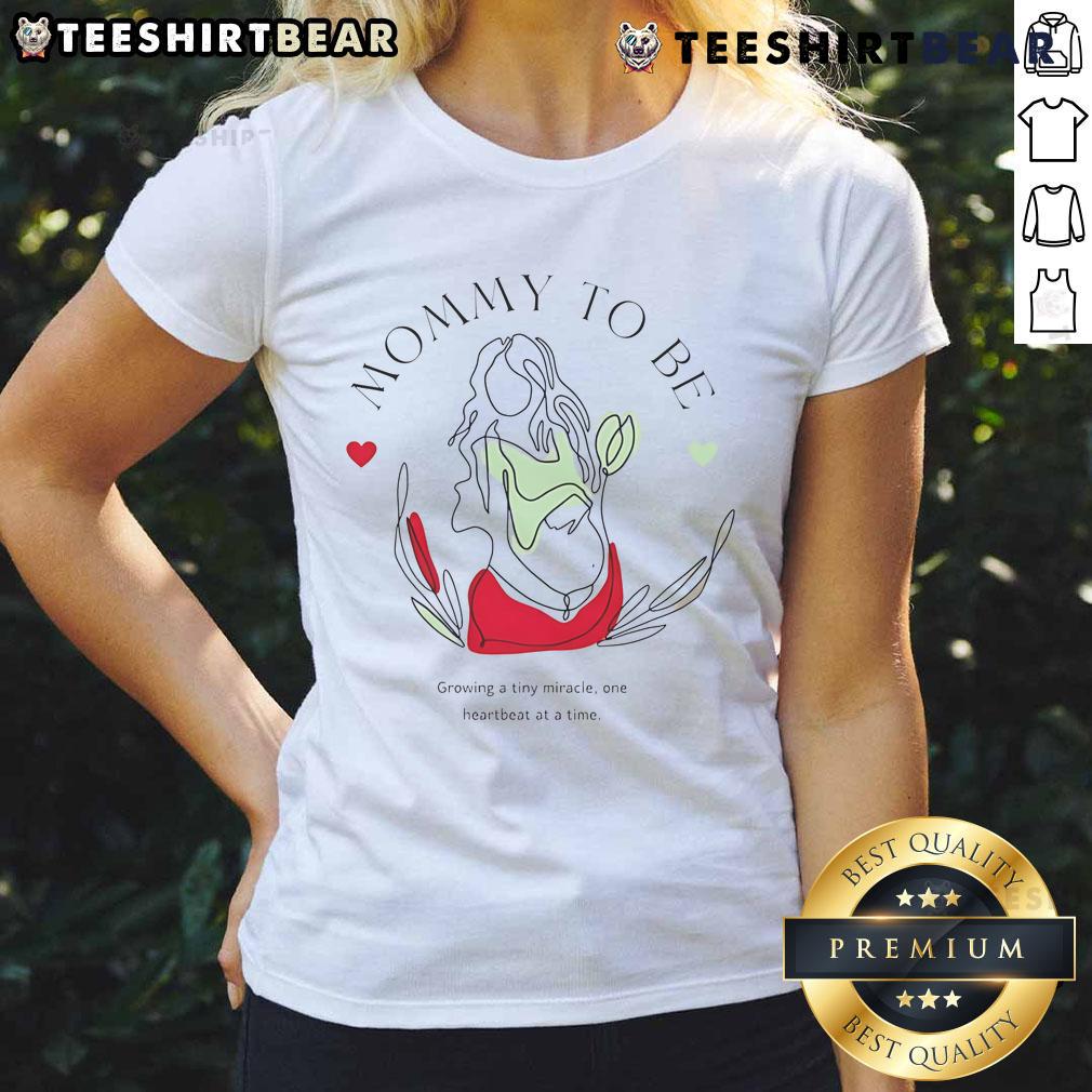 Top Mommy To Be growing a tiny miracle ladies tee, featuring a stylish design for expectant mothers.