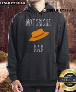 Trendy Top No-Torious Dad Hat and Hoodie combo, perfect for casual streetwear style and comfort.