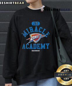 Alt Text: Oklahoma City Thunder Miracle Academy NBA Collection Sweatshirt showcasing vibrant team colors and logo design.
