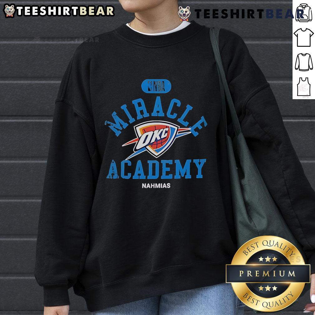 Alt Text: Oklahoma City Thunder Miracle Academy NBA Collection Sweatshirt showcasing vibrant team colors and logo design.