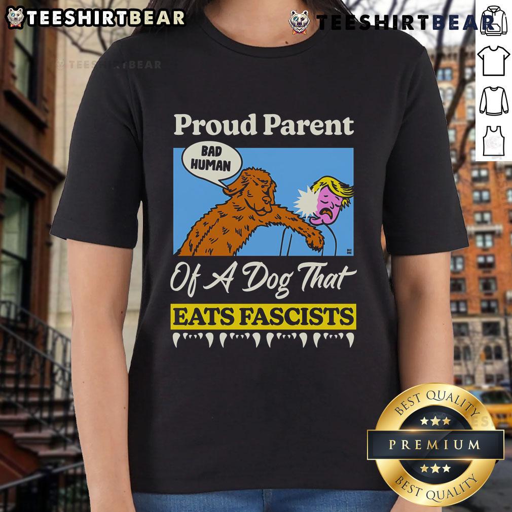 Top Proud Parent of a Dog That Eats Fascists ladies tee featuring a playful dog graphic and bold text design.