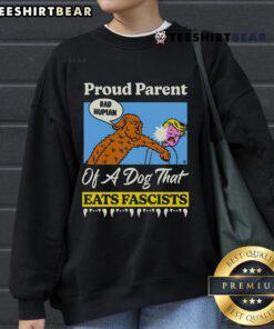 Top Proud Parent of a Dog That Eats Fascists sweatshirt featuring bold text and a playful design, perfect for dog lovers.