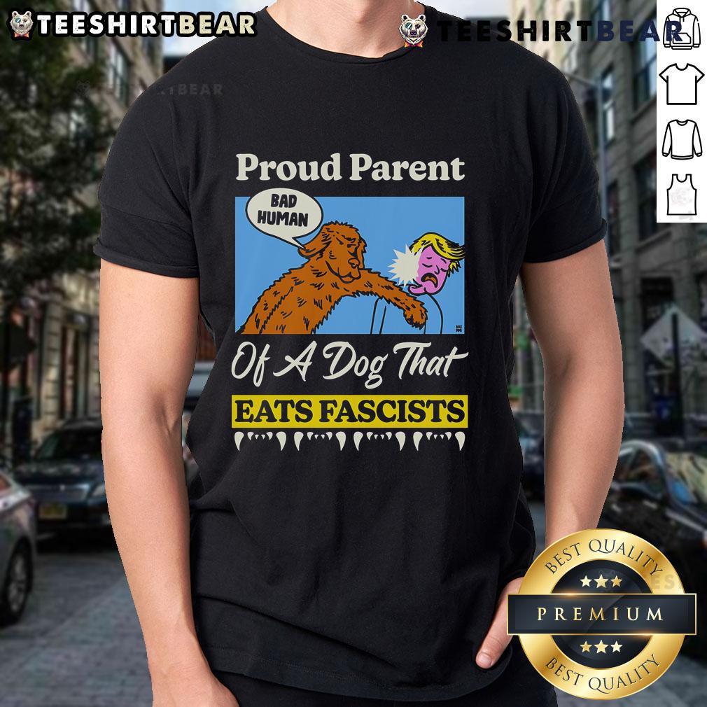 Alt Text: Top Proud Parent Of A Dog That Eats Fascists T-Shirt featuring a humorous graphic design for dog lovers.