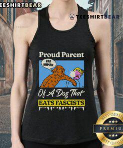 Top proud parent of a dog that eats fascists tank top design featuring a playful dog graphic and bold text.