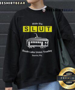 Cozy sweatshirt featuring 'Top Ride the SLUT' design, perfect for fans of the South Lake Union Trolley in Seattle, WA.