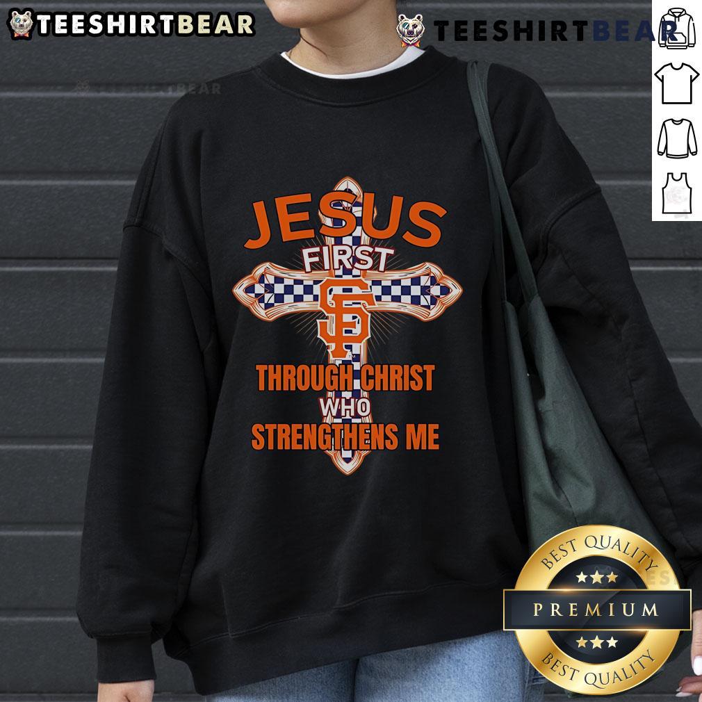 Top San Francisco Giants sweatshirt featuring 'Jesus First' and 'Through Christ Who Strengthens Me' design.