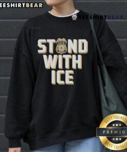 Top Stand With ICE US Sweatshirt featuring a bold graphic design promoting immigration enforcement support.