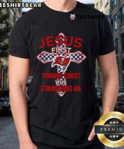 Alt Text: Top Tampa Bay Buccaneers Jesus First T-Shirt featuring 'Through Christ Who Strengthens Me' design for fans.