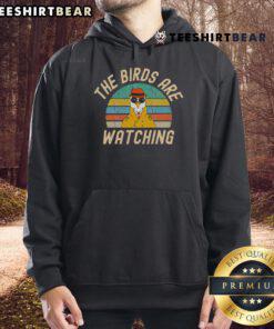 Alt Text: Top The Birds Are Watching Wake Up America hoodie featuring a vibrant design and comfortable fit for casual wear.