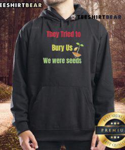 Top They Tried To Bury Us We Were Seeds Hoodie featuring inspirational quote design on a stylish, comfortable hoodie.