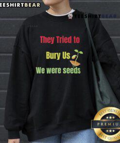 Top They Tried To Bury Us We Were Seeds sweatshirt featuring inspirational quote and stylish design.