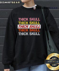 Top Thick Skull Raglan Sweatshirt featuring a bold skull design on a comfortable, stylish pullover for casual wear.