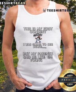 Excited fan in a tank top at their first concert, ready to see Drake, capturing the thrill of live music.
