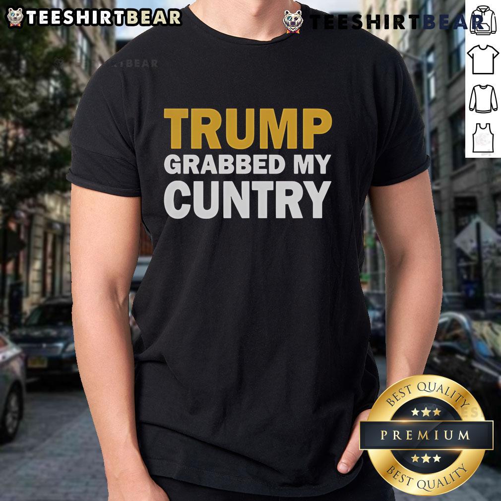 Top Trump Grabbed My Country T-Shirt featuring bold graphics and a playful design for political humor enthusiasts.