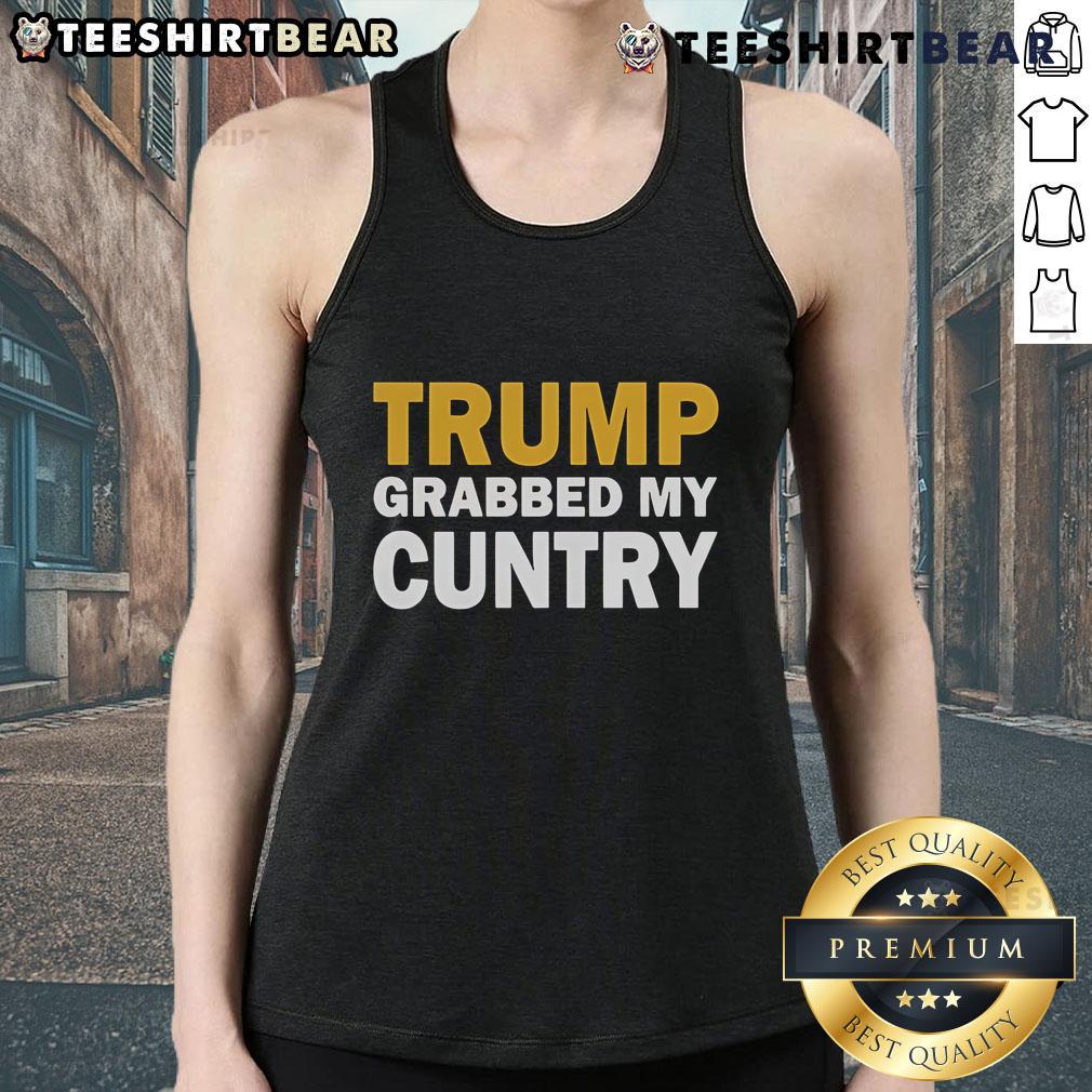 Alt Text: Top Trump Grabbed My Country tank top featuring bold graphic design, perfect for political statement and fashion.