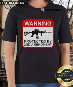 Alt Text: Top warning graphic on a 2nd Amendment ladies tee, promoting gun rights and women's empowerment in stylish apparel.