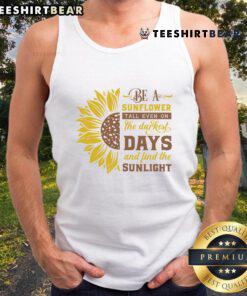 Sunflower tank top featuring an inspiring quote, perfect for brightening dark days and finding sunlight. Shop now!
