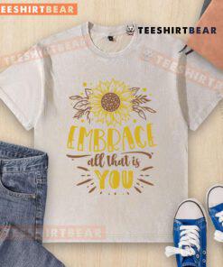 Awesome Embrace All That Is You washed t-shirt displayed on a hanger, showcasing its unique design and soft fabric.