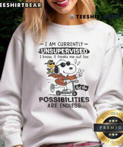 Alt Text: Awesome Snoopy and Woodstock sweatshirt with 'I Am Currently Unsupervised' text, perfect for Peanuts fans.