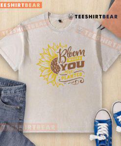 Awesome sunflower bloom design on a washed t-shirt, perfect for expressing positivity wherever you are planted.