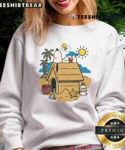 Alt Text: Cute Snoopy and Woodstock graphic on a beach-themed sweatshirt, perfect for summer vibes and casual wear.