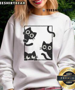 Adorable cute felines in frame sweatshirt showcasing playful cat designs perfect for cat lovers and cozy fashion.