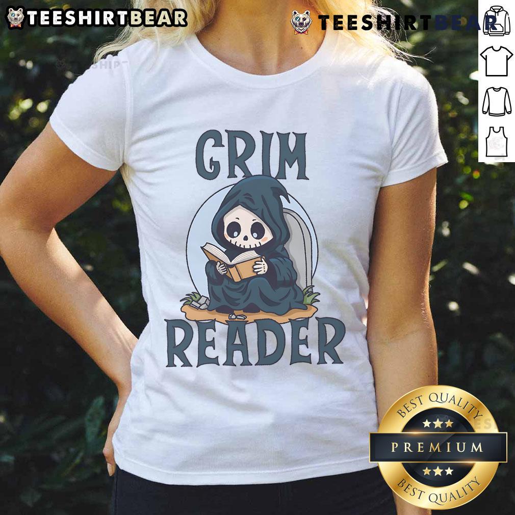 Alt Text: Cute Grim Reader wearing a ladies tee, engrossed in reading a book, showcasing a whimsical literary vibe.