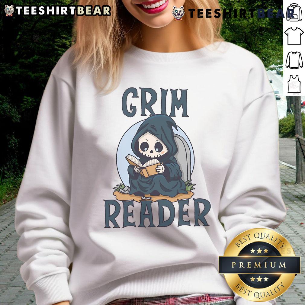 Cute Grim Reader wearing a cozy sweatshirt while reading a book, perfect for book lovers and cozy vibes.