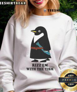 Cute penguin wearing a Rizzem With The Tism sweatshirt, showcasing fun and playful style perfect for cozy outfits.