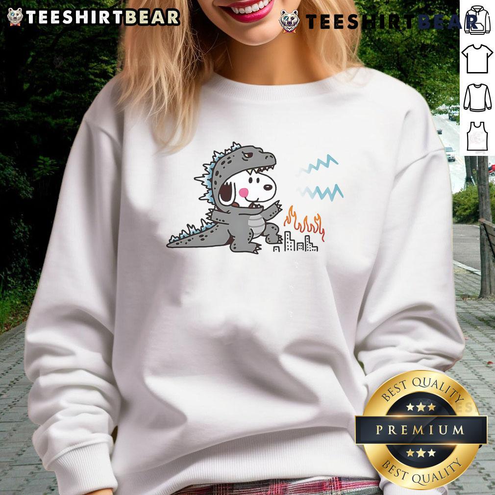 Cute Snoopy in a Godzilla disguise on a cozy sweatshirt, perfect for fans of unique and whimsical apparel.