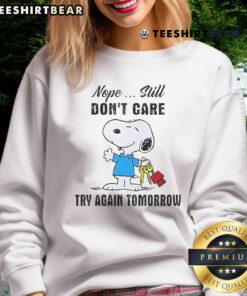 Cute Snoopy Nope Still Dont Care Try Again Tomorrow Sweatshirt featuring Snoopy's playful design and relaxed fit.