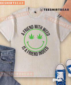 Alt Text: Funny A Friend With Weed Is A Friend Indeed washed t-shirt featuring a playful cannabis-themed design.
