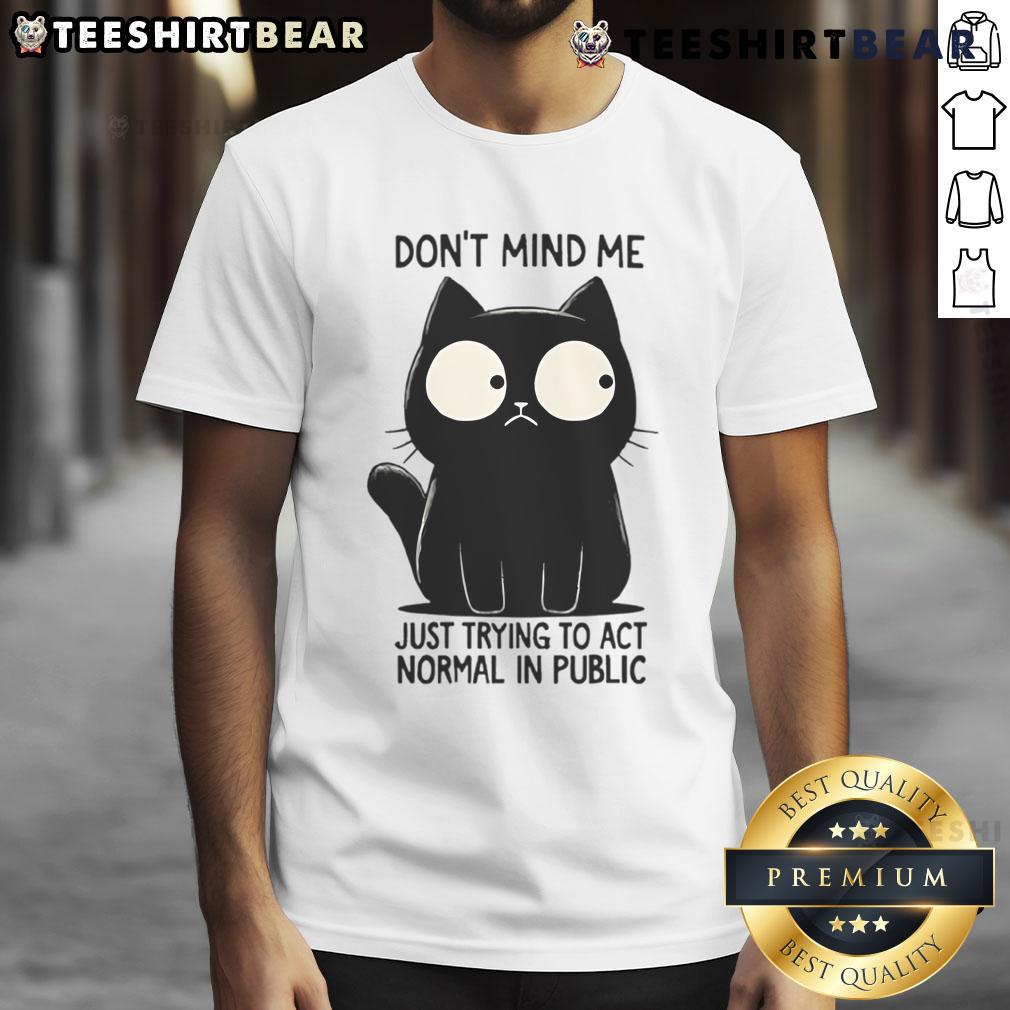 Funny cat on a t-shirt with the phrase Don't mind me, just trying to act normal in public for cat lovers.