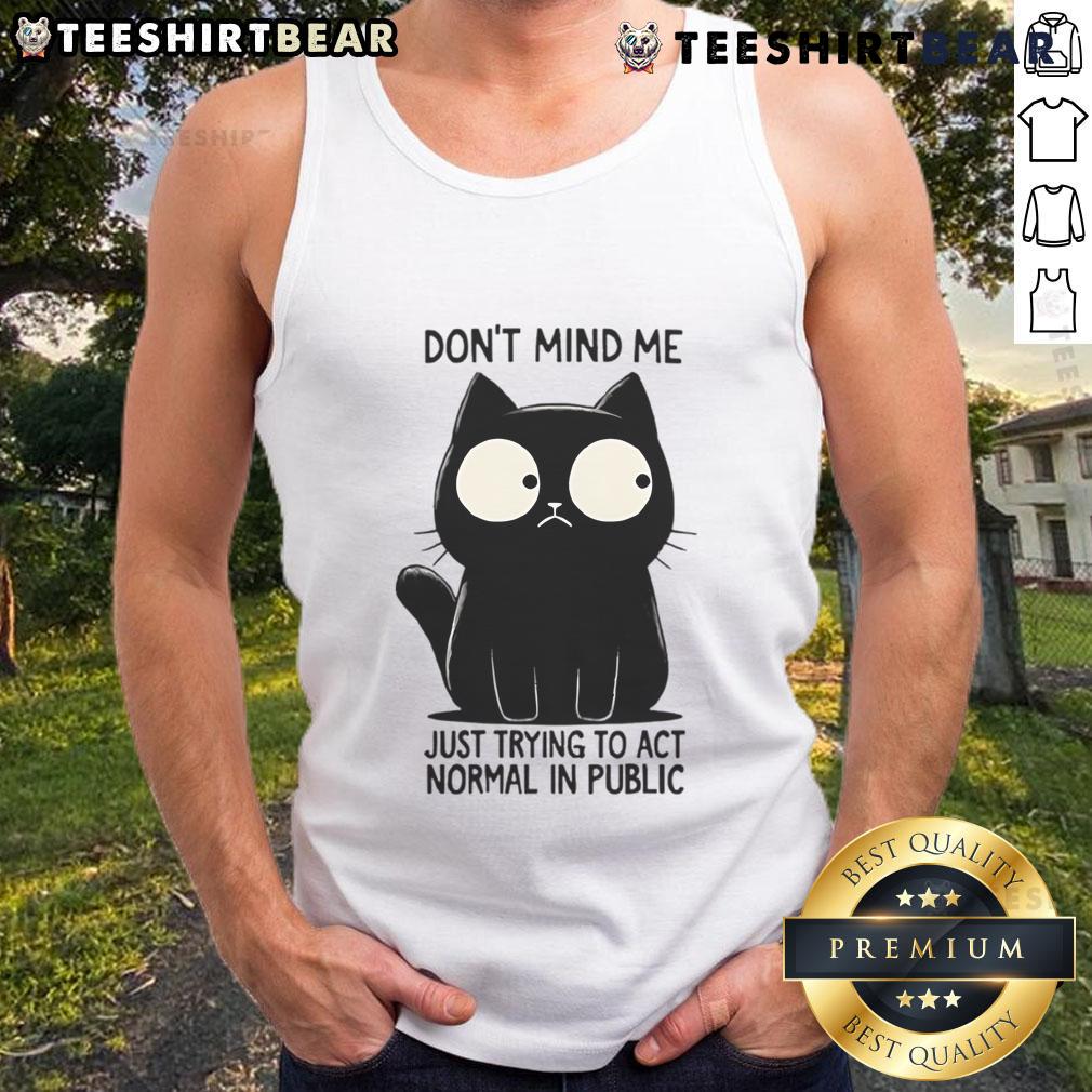 Funny cat in a tank top pretending to act normal in public, showcasing its quirky personality and playful charm.