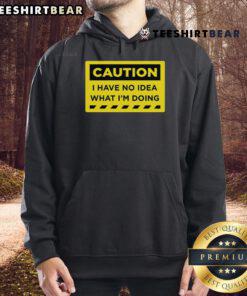 Funny 'Caution: I Have No Idea What I'm Doing' hoodie design featuring a humorous graphic for casual wear.
