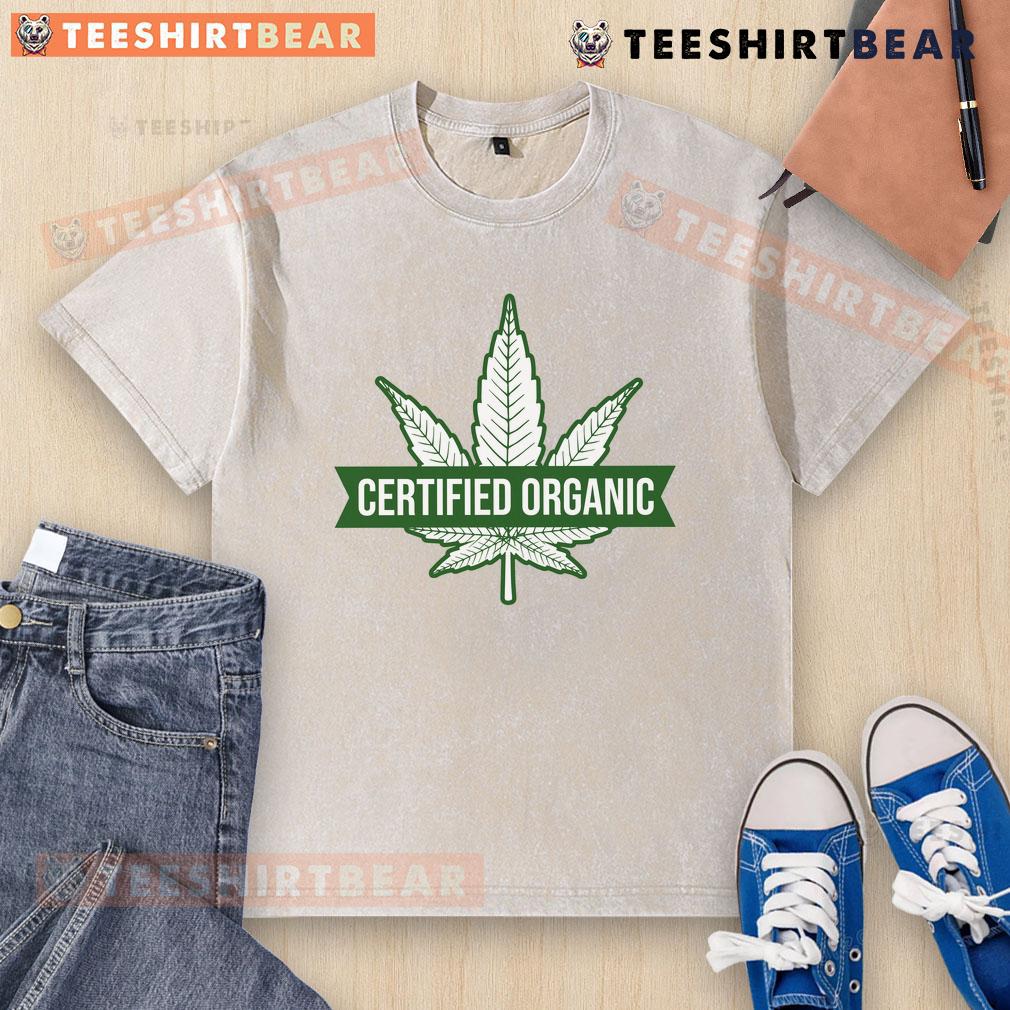 Funny certified organic cannabis leaf design on a washed t-shirt, perfect for eco-conscious cannabis enthusiasts.