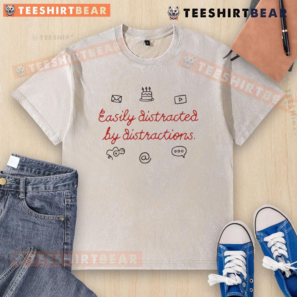 Alt Text: Funny Easily Distracted by Distractions washed T-shirt featuring playful graphics and humor for casual wear.