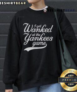 Alt Text: Funny I Got Wanked at the Yankees Game sweatshirt featuring bold text and a casual design, perfect for fans.
