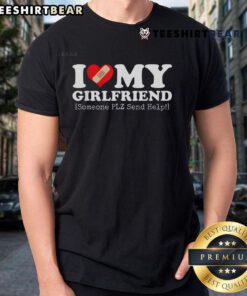 Funny 'I Love My Girlfriend, Someone Plz Send Help' bandage heart T-shirt design for couples and humor lovers.