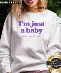 Funny 'I'm Just A Baby, Don't Spank Me' sweatshirt featuring playful design for parents and caregivers.