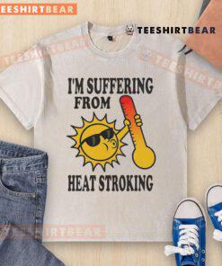 Funny 'I'm Suffering From Heat Stroke' washed t-shirt displayed on a mannequin, perfect for summer humor and casual wear.