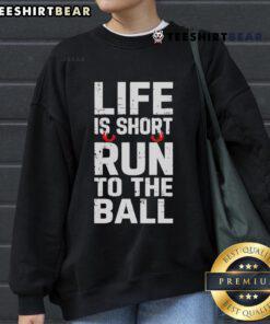 Alt Text: Funny 'Life Is Short, Run to the Ball' sweatshirt design featuring vibrant colors and playful typography. Perfect for dog lovers!