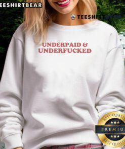Funny Underpaid and Underfcked Sweatshirt featuring humorous text design, perfect for casual wear and expressing personality.
