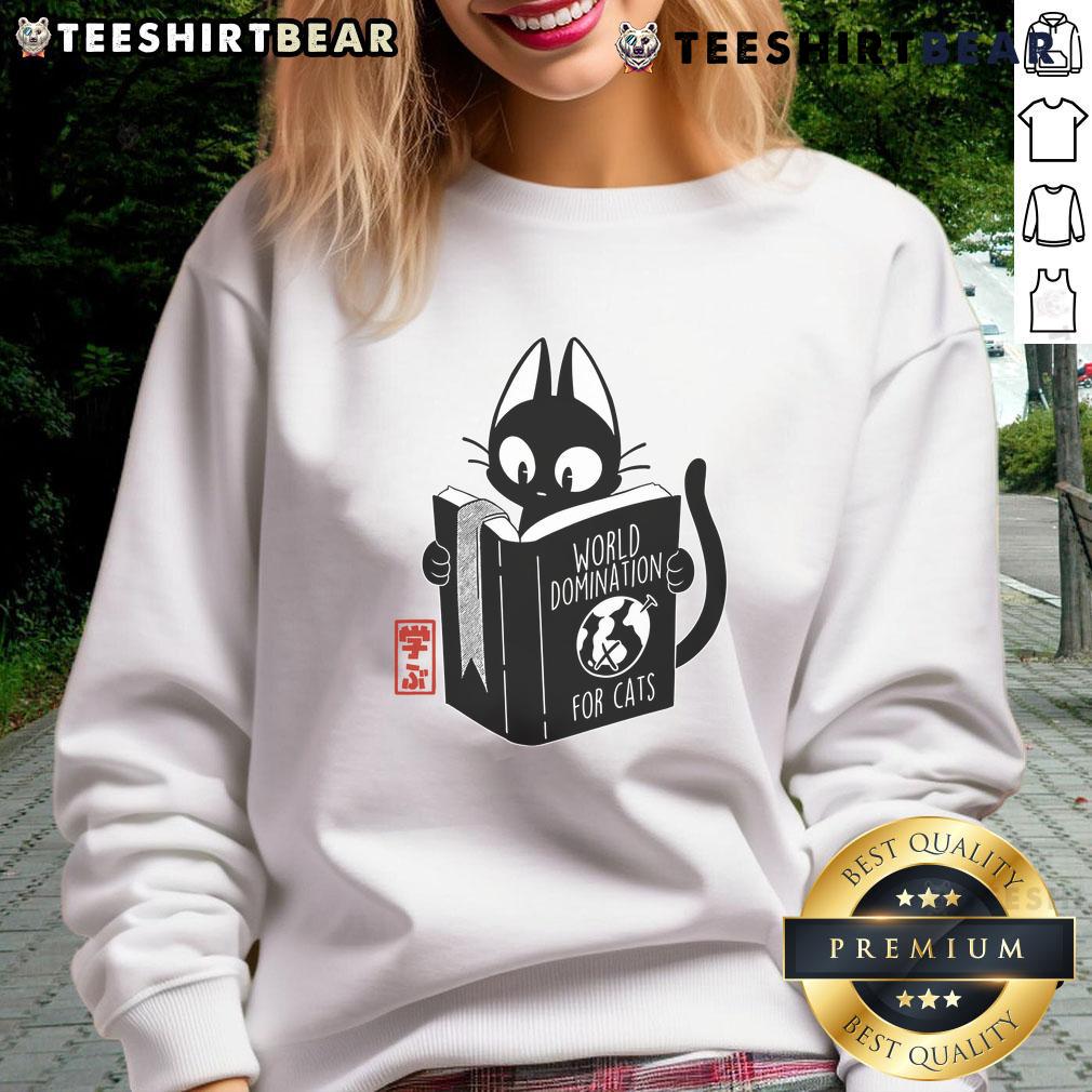 Funny World Domination for Cats book cover on a cute sweatshirt, perfect for cat lovers and humor enthusiasts.